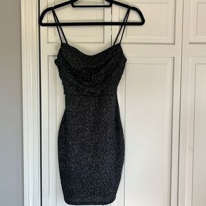 Sparkly black mini dress for parties and school dances.